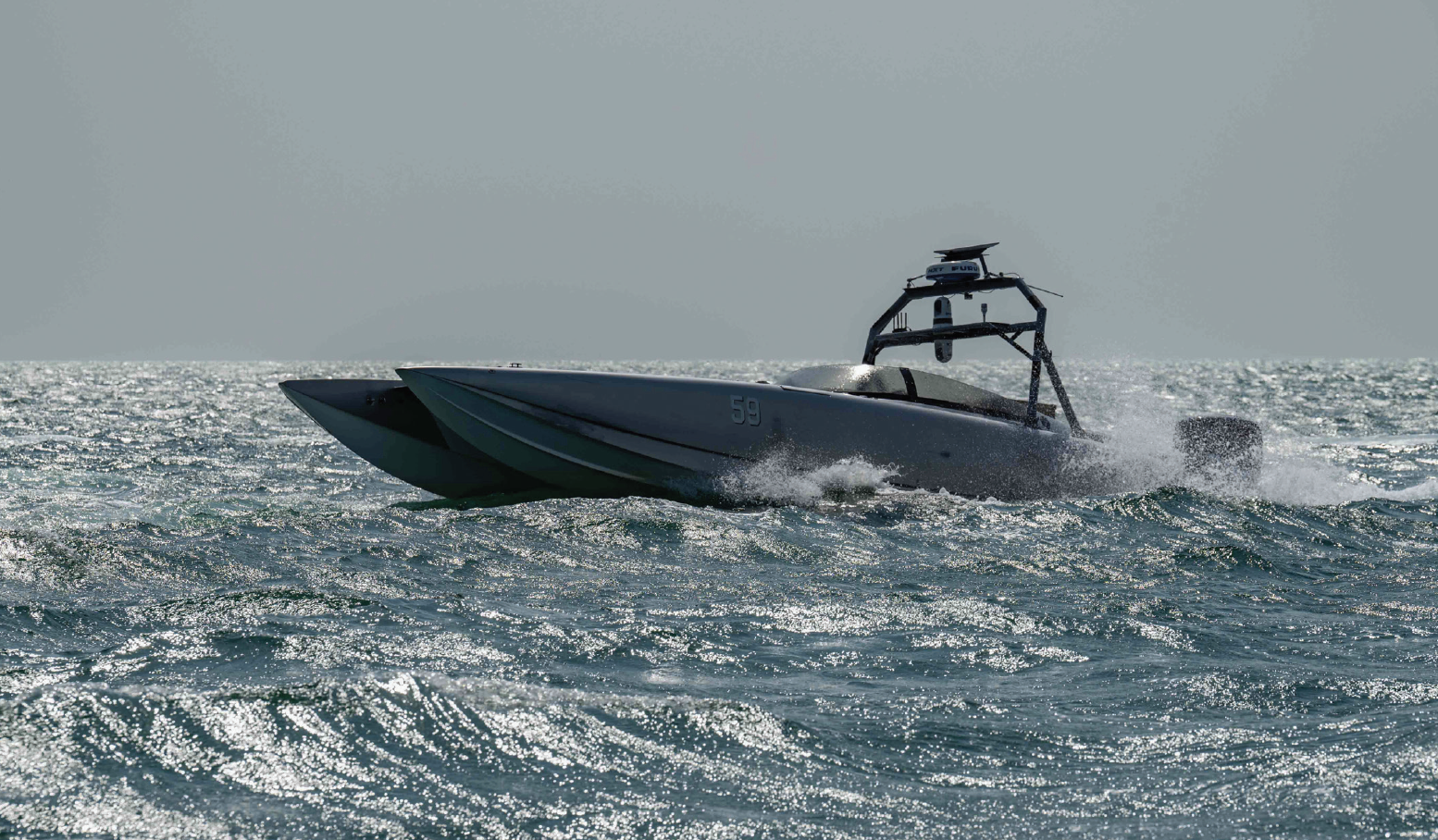 MARTAC T38 Devil Ray unmanned surface vessel attached to 5th Fleet’s Task Force 59 sails in Arabian Gulf, October 26, 2023 (U.S. Navy/Jacob Vernier)